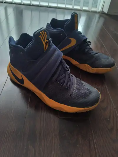 Used Kyrie 2 Basketball shoes for all type of sports or walking Navy blue and yellow (gold) Size 13...