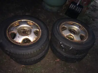 4 rims off of a honda crv motomaster winter edge 3 tires in good shape only used 2 winters 1 went fl...