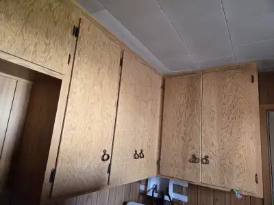 Kitchen cabinets with a kitchen counter top, View more