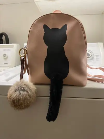 cat back back , View more