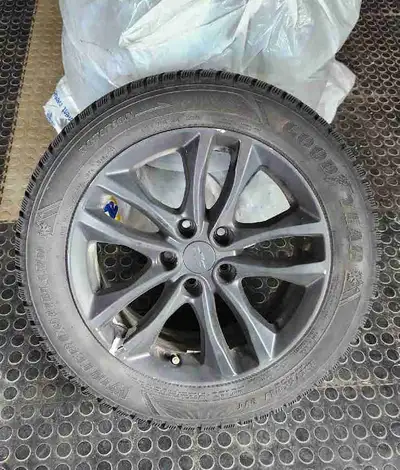 Set of 4 Good Year winter command tires with Chevy rims painted black. Used for only 1 winter. 90% t...