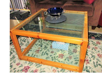 Two Tier GLASS COFFEE TABLE on WHEELS...78 cm w x 48 cm h