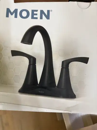 Add a touch of modern elegance to your bathroom with this brand new Moen Korek 84467BL bathroom fauc...