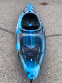 Pelican mission 100 sit in kayak  with paddle