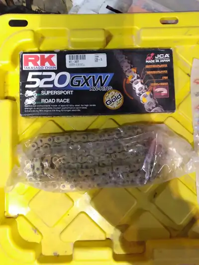 Get ready to enhance your motorcycle's performance with this new RK 520GXW gold chain, designed for...