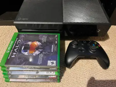 Xbox One with controller and games, View more