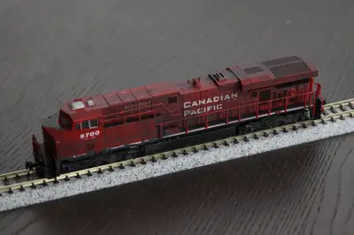 N Scale Canadian Pacific ES44AC by Kato, weathered, View more