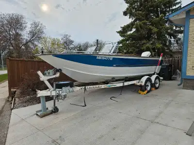 21ft Sylvan aluminum boat 1990 Johnson 225 Two stroke motor All new upholstery and seats Sits 8 peop...