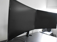 Two 27” Samsung LCD LED Curved Monitors