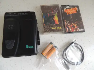 Genexxa 14-8823 AM/FM/Cassette Portable Player w.2 tapes, phones, View more