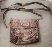 Guess small crossbody. Retail $110 selling for $20 firm, new wit