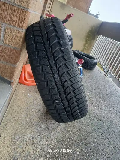 One winter tire size 215/65/17 never used. Asking $50 firm. Also i have one all season in an excelle...
