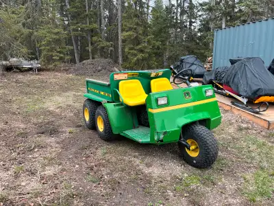 Need a work horse for around your property. This 5 wheeled machine is the answer. Push button dump m...