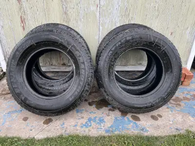 I am selling a set of four Dunlop tires, sized 265 70R17, that are in good used condition. These tir...