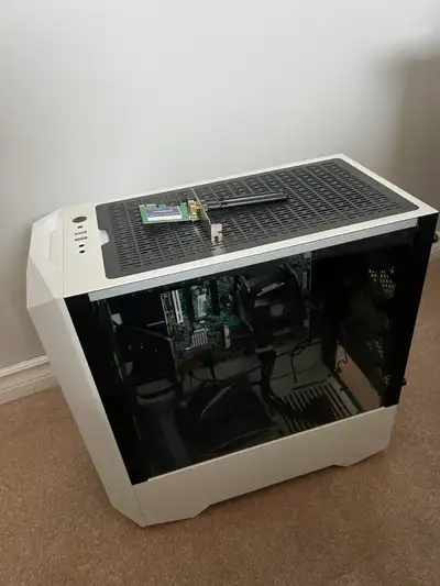 PC case with top ports and glass sides. Some parts are still in there and are fully functioning. I w...