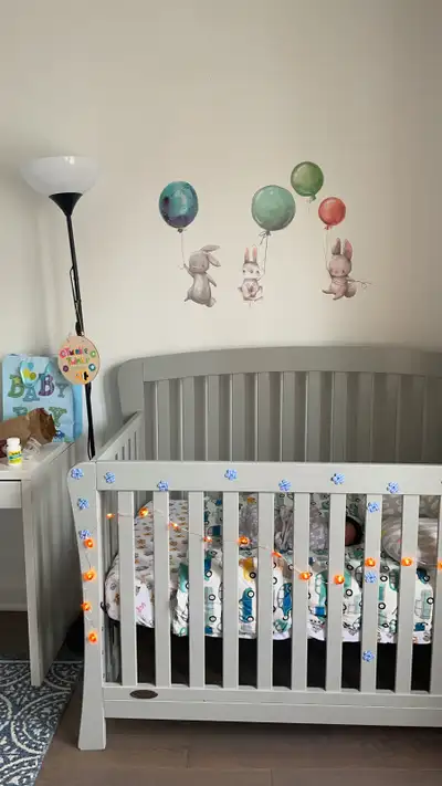 This crib comes with organic mattress and fitted sheet .The height is adjustable also the front can...