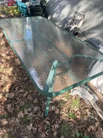 6-8 seater temp glass. Table 7’X3.5’ Patio set, green metal 5 Chairs Green netal.