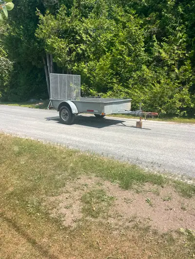 Galvanized utility trailer, 5’x8’, ramp door, new lights and wiring, tongue Jack, in excellent shape...
