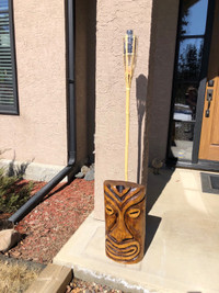 Chainsaw tiki torch holder carving 