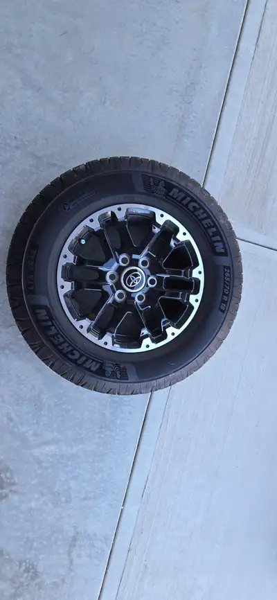 Complete set of tires and rims for Toyota Tundra. The wheels are Michelin LTX Trail 265/70 18 with T...