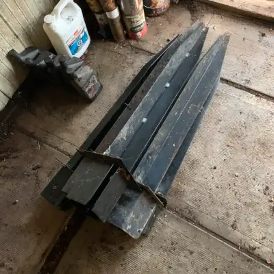 I'm selling a set of used fence post spikes, each measuring approximately 36 inches in length. These...