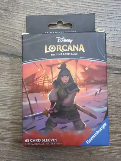 trading card sleeves from the first release of Lorcana the Disney TCG. Used but undamaged.