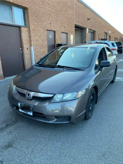2009 Honda Civic DX – ~176,100 km – Gray Runs and drives smoothly. Very reliable car; perfect for da...