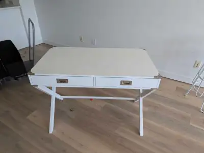 2 Desks $75 For both or $50 for white, 25 for brown. Brown one has charging ports, and comes with 4...