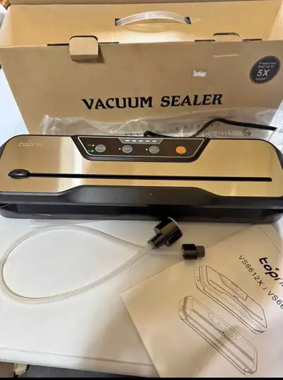 Like new - used less than a hand full of times. Works like new. Toprime Vacuum Sealer Machine VS6612...