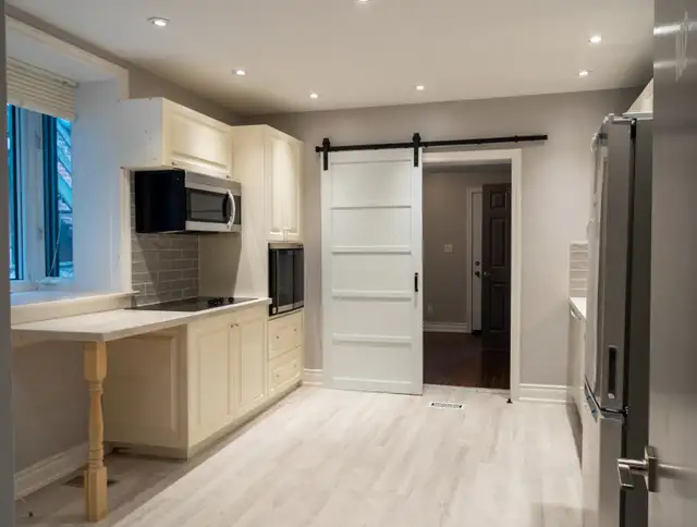 1 bedroom ground-level apartment with private yard