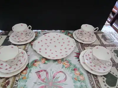$100.00 for the following pieces of Royal Albert fine bone china 4 tea cup & saucer sets, 4 tea plat...