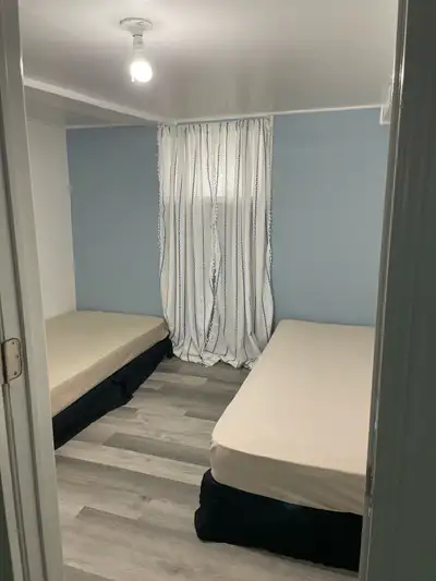 Sharing or Couple basement room July availability