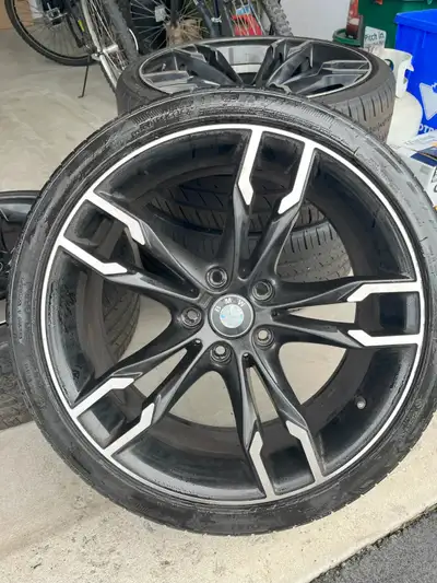 A set of 4 BMW M4 replica wheels with tires. Aside from a few scratches, they are in very good condi...