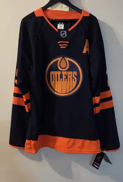 Large Variety of Oilers Navy & Orange Jerseys!!, View more