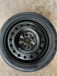 Good Year Spare Tire from a 2014 Honda Civic - T125 / 70D15 95M