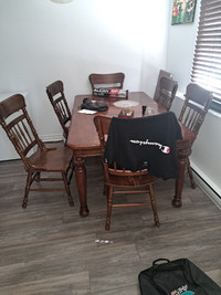 Solid wood dining room table with middle and 6 chairs