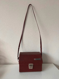 Vintage Tokina leather camera case with red velvet interior