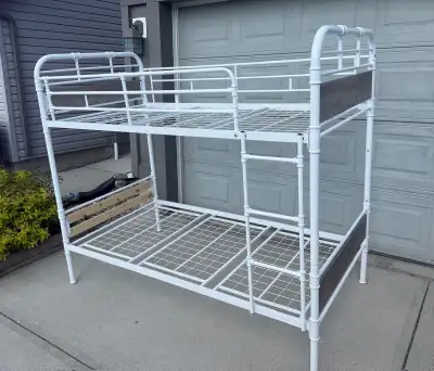 In good condition,can be used 2 single bed, Pickup south west, Delivery extra 30$! Twin sz mattress...