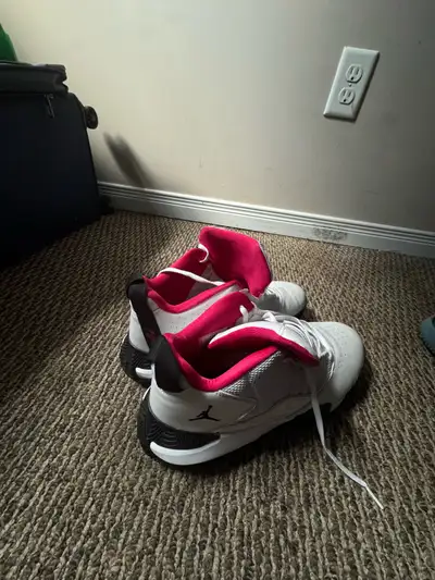 Jordan Stay Loyal sneaker in a white, black, and rush pink color, View more