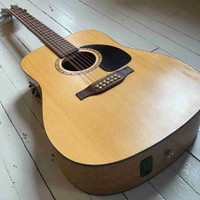 Simon and Patrick 12 string acoustic guitar