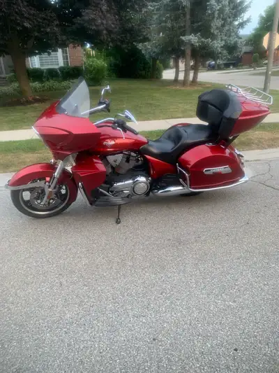 2013 Victory Cross Country Tour motorcycle. Sunset Red Metallic colour. 106 cu. in. air/oil cooled e...