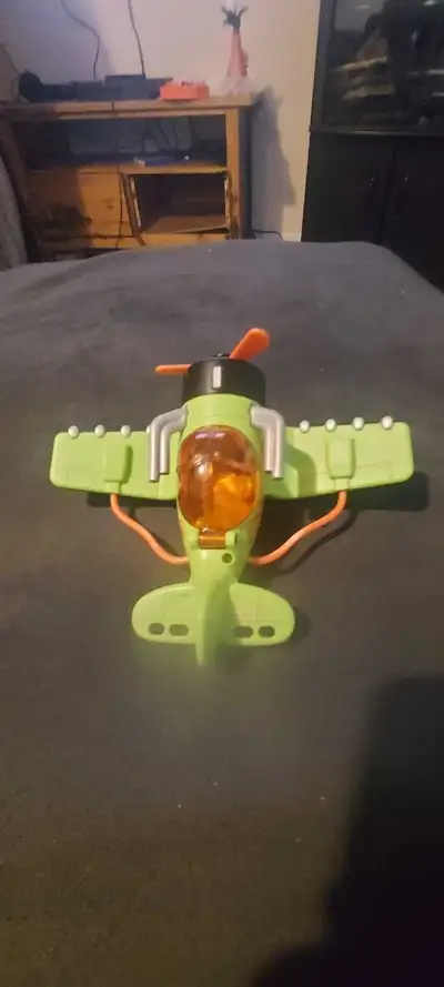 Green toy plane flame 7, View more