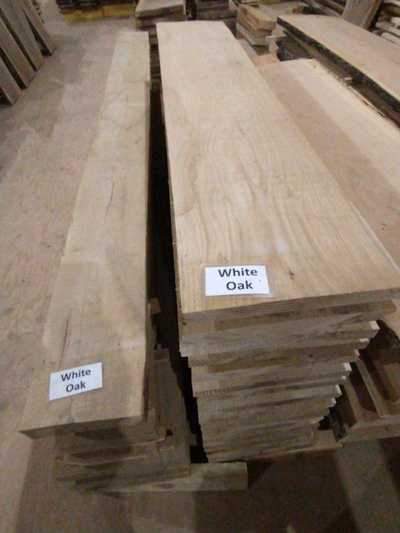 Air dried flat sawn hardwood lumber, 1 to 2 inches thick, 5-12 inch wide. Sawmill finish, live edge...