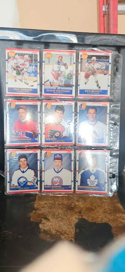 Selling a collection of used Score Hockey cards, carefully stored in plastic sleeves. These cards ar...