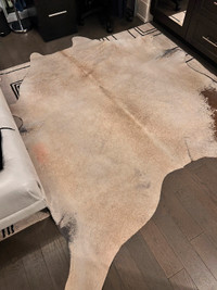 Real cow hide carpet 7 and a half feet by 6 feet