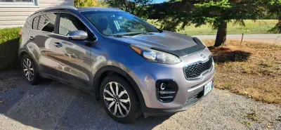 Get ready to explore in this 2017 Kia Sportage EX AWD, a reliable SUV ready for any adventure! It of...