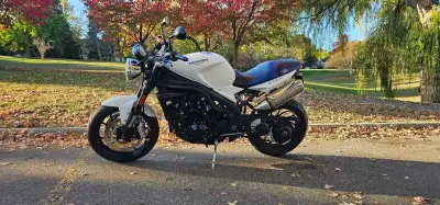 This used 2011 Triumph Speed Triple SE is a powerful and stylish motorcycle ready for the road. The...
