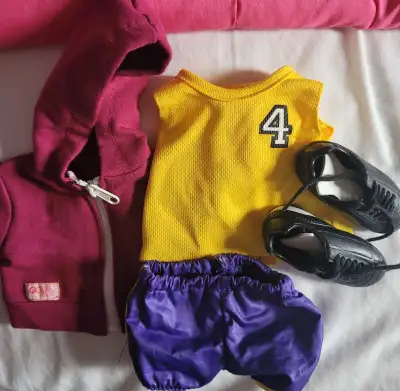 Our Generation soccer outfit Hoodie, jersey, shorts, cleats, ball. I have 2, but one is missing the...