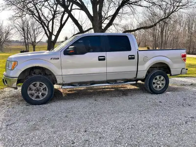 2010 f150 xlt 4x4 for sale, runs and drives. Has exhaust leak and coolant leak. Unlikely can be safe...