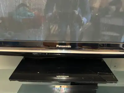 TV stand with 3 levels of glass and metal., View more